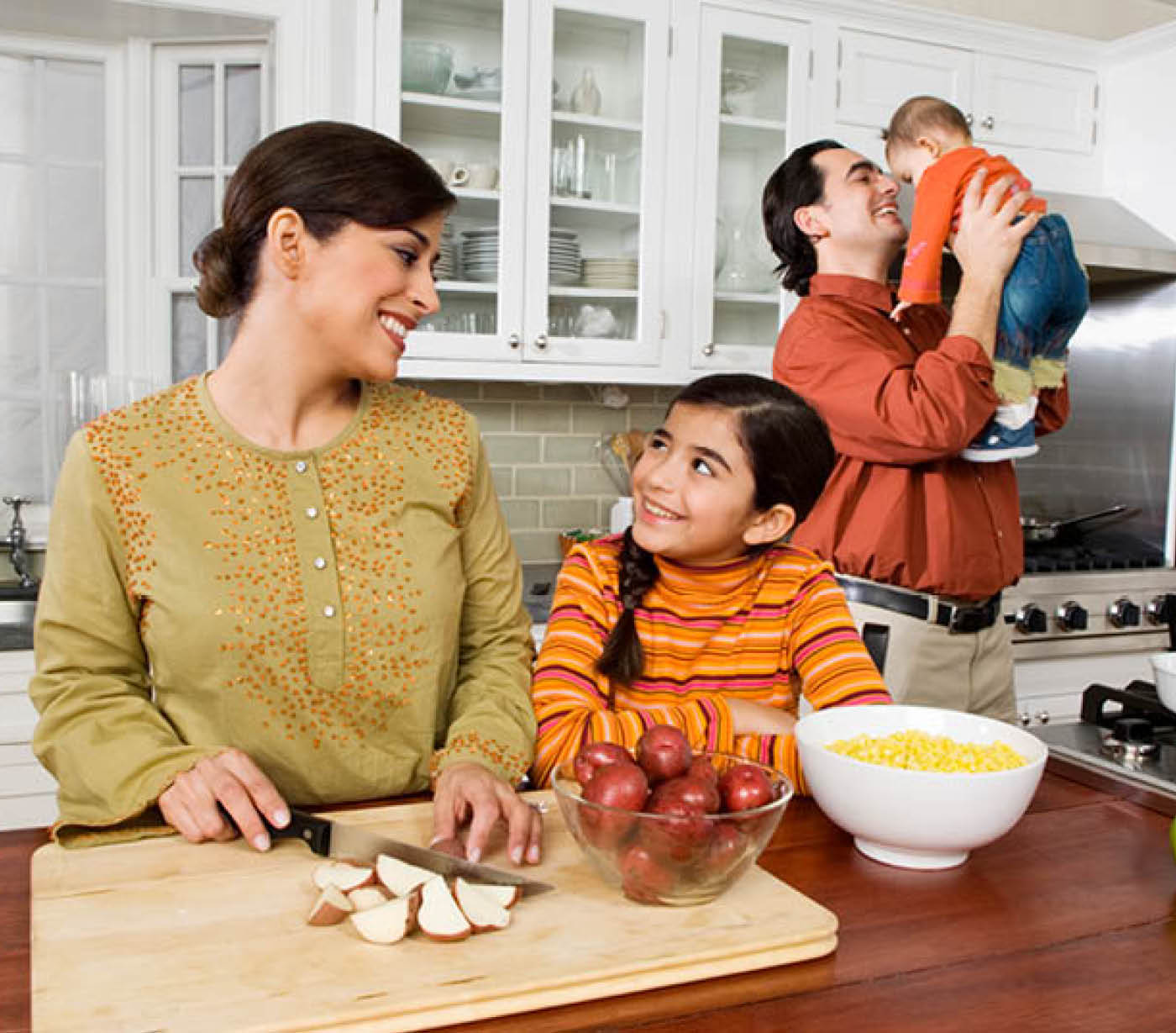 A family cooking in a kitchen