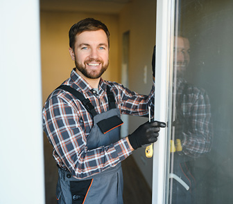 Man installing a window